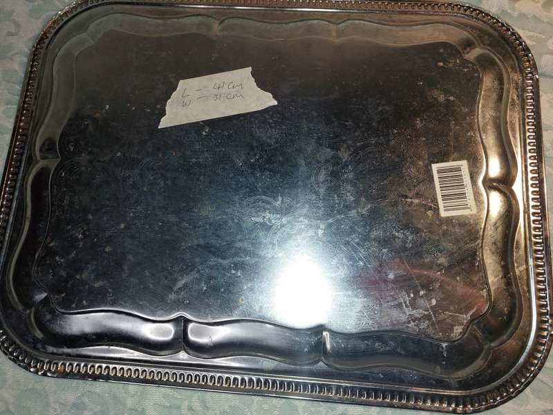 A VINTAGE SILVER PLATED RECTANGULAR SERVING TRAY SOLD AS IS