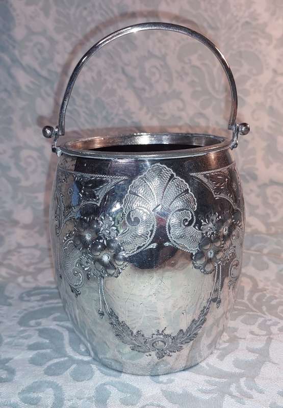 A VINTAGE ICE BUCKET WITH HALLMARKS AND A REGISTRATION NUMBER
