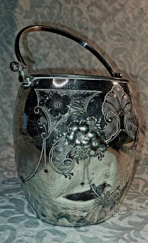 A VINTAGE ICE BUCKET WITH HALLMARKS AND A REGISTRATION NUMBER