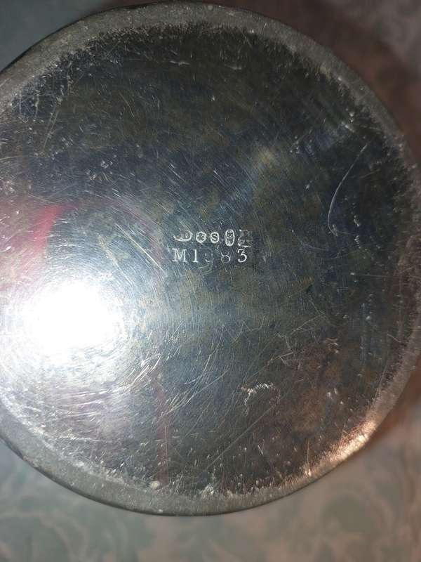 A VINTAGE ICE BUCKET WITH HALLMARKS AND A REGISTRATION NUMBER
