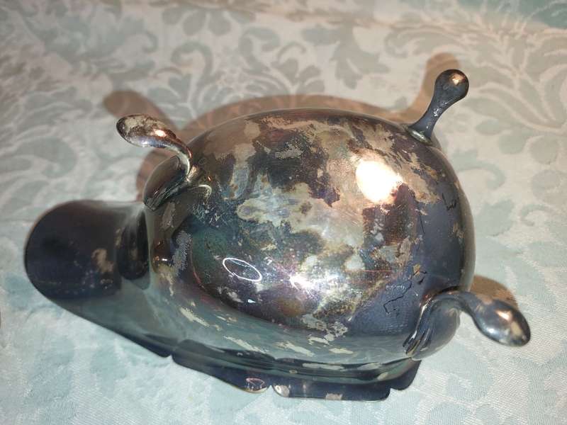 TWO ANTIQUE SAUCE JUGS ONE NEEDS A HANDLE REPLACED SOLD AS IS