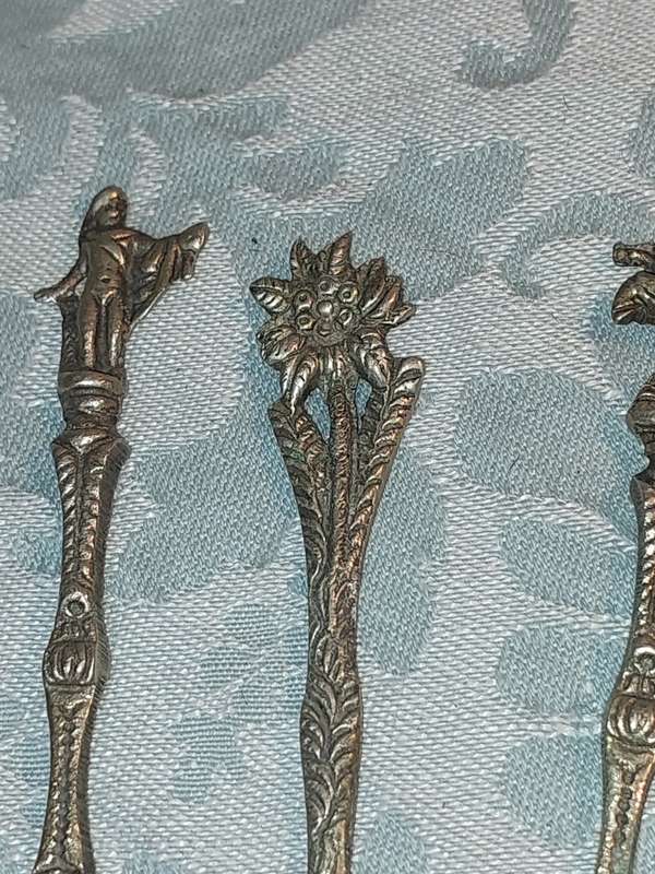 A COLLECTION OF ITALIAN PASTRY FORKS SOLD AS IS