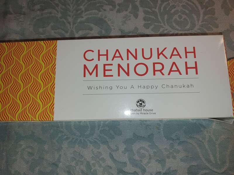 A CHANUKAH MENORAH AND CANDLES