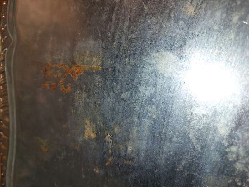 A VINTAGE SERVING TRAY NEEDS POLISHING SOLD AS IS