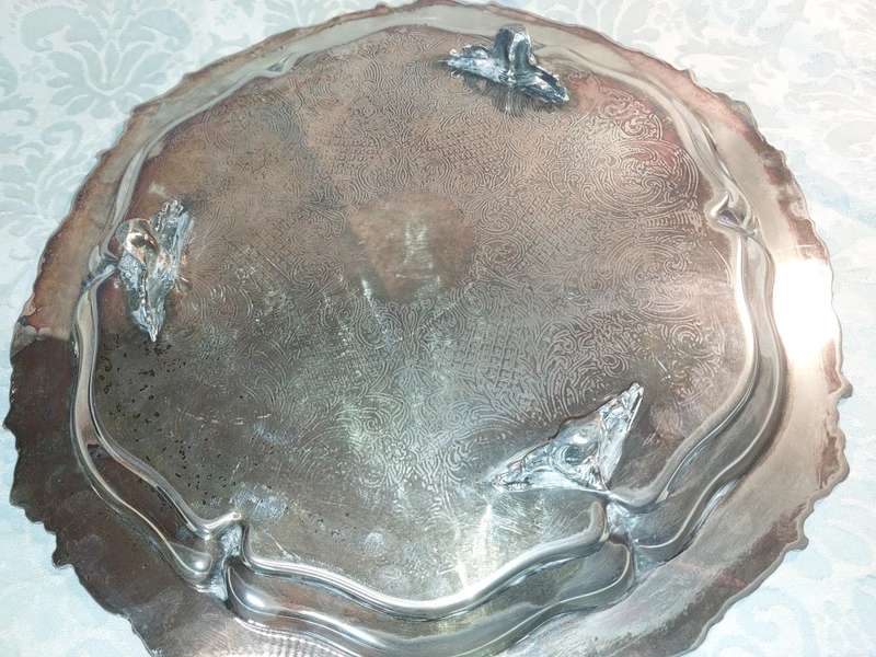 A ROUND VINTAGE VICTORIAN SERVING TRAY SILVER PLATED SOLD AS IS