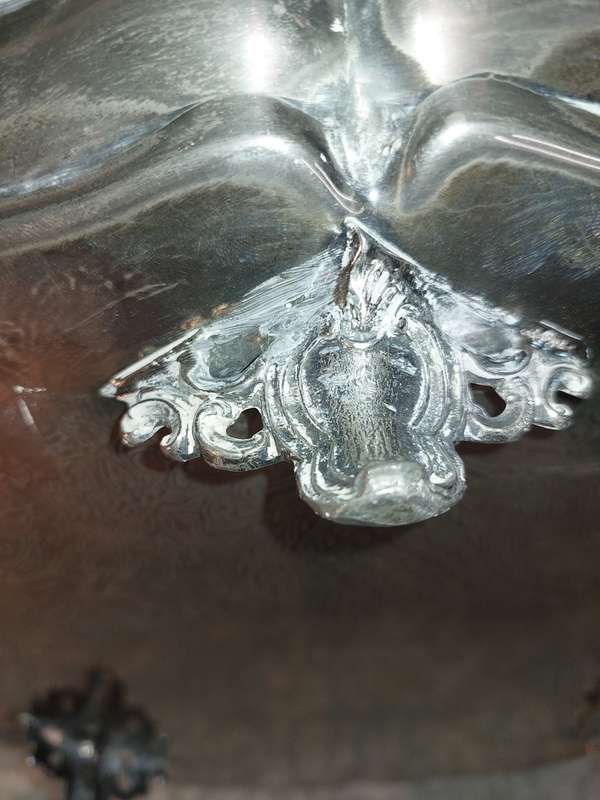A ROUND VINTAGE VICTORIAN SERVING TRAY SILVER PLATED SOLD AS IS