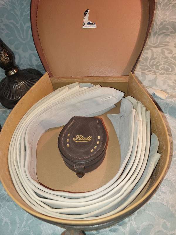 AN ANTIQUE MANAQUIN FOR JEWELRY AND TWO GENUINE LEATHER JEWELRY