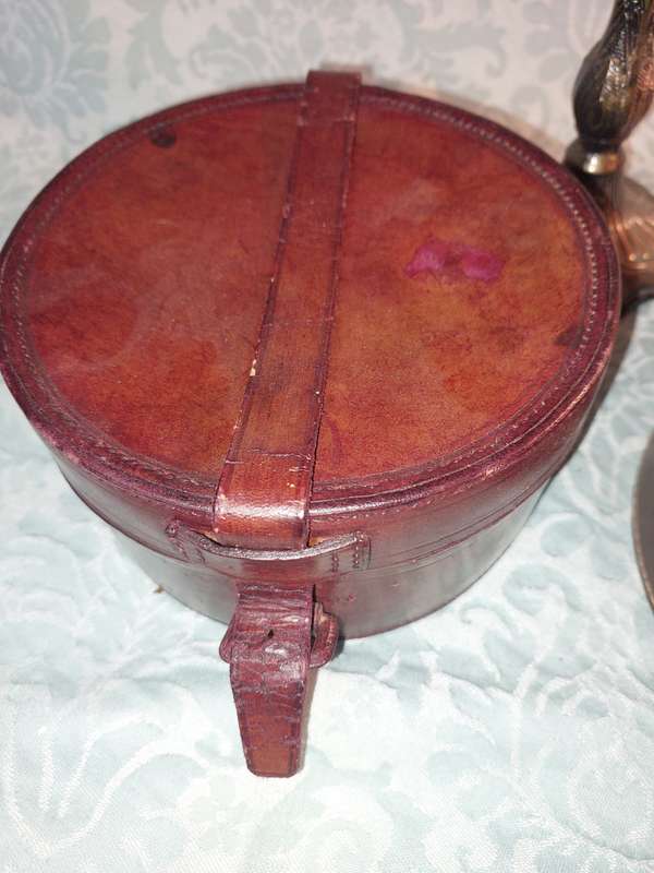AN ANTIQUE MANAQUIN FOR JEWELRY AND TWO GENUINE LEATHER JEWELRY