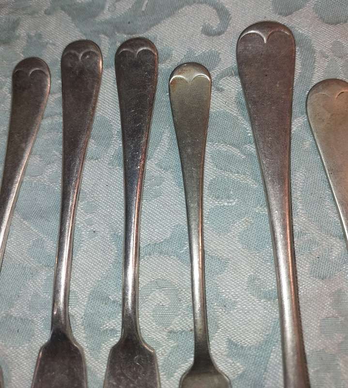 A VINTAGE COLLECTION FISH KNIVES AND FORKS SOLD AS IS