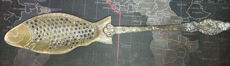A VINTAGE BRASS ORNATE ART DECOR LADEL A FISH DESIGN