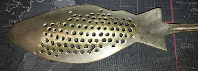 A VINTAGE BRASS ORNATE ART DECOR LADEL A FISH DESIGN
