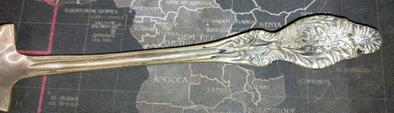 A VINTAGE BRASS ORNATE ART DECOR LADEL A FISH DESIGN