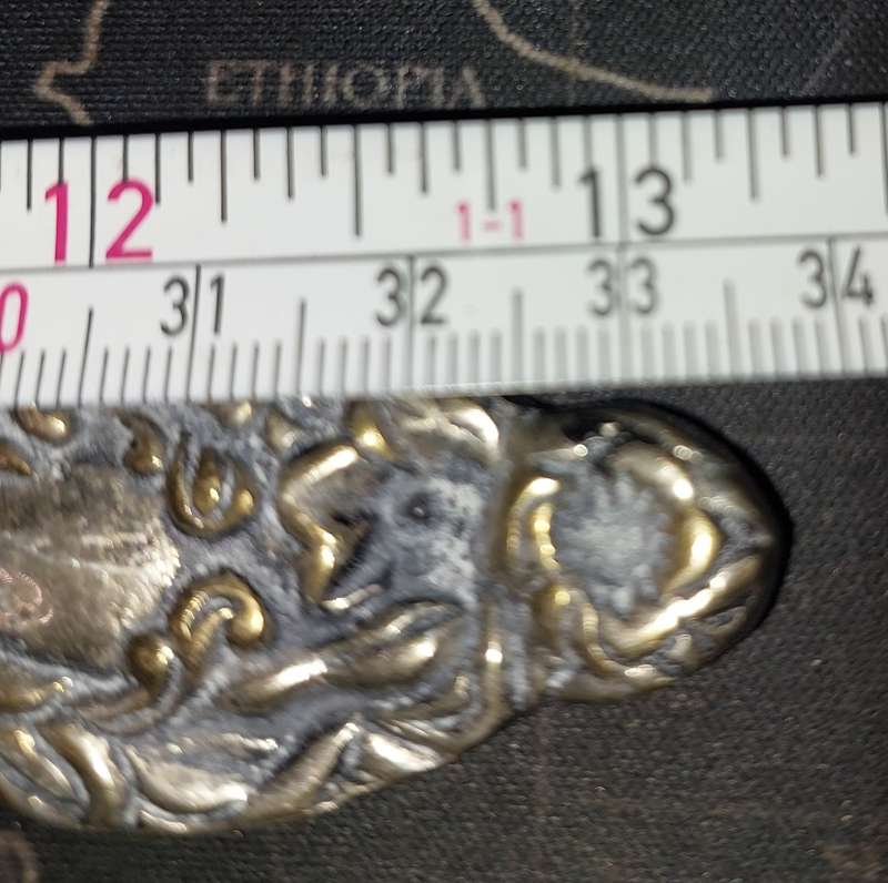 A VINTAGE BRASS ORNATE ART DECOR LADEL A FISH DESIGN