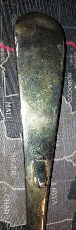 A SOLID SILVER PLATED SOUP LADLE APPROXIMATELY 33 CENTIMETERS IN LENGTH