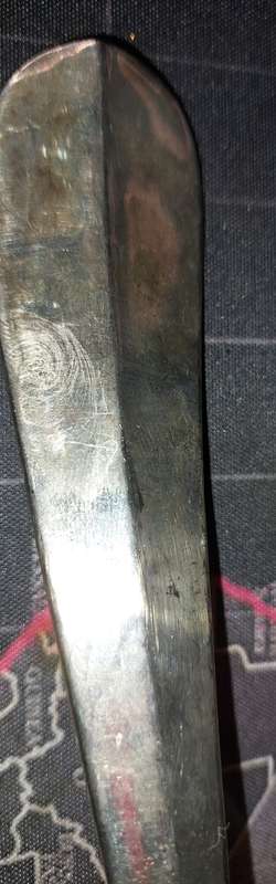 A SOLID SILVER PLATED SOUP LADLE APPROXIMATELY 33 CENTIMETERS IN LENGTH