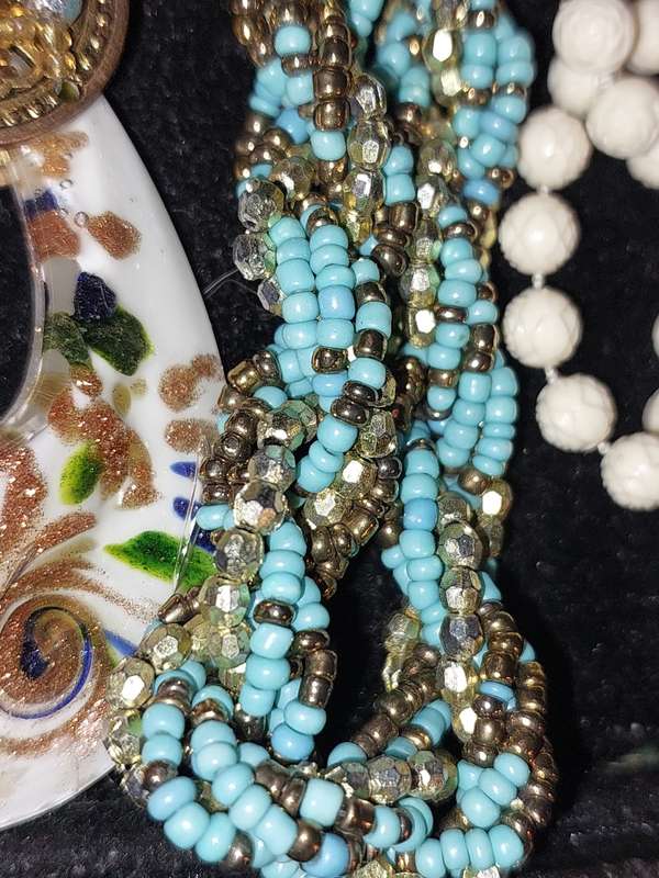 A COLLECTION OF COSTUME NECKLACES SOLD AS IS