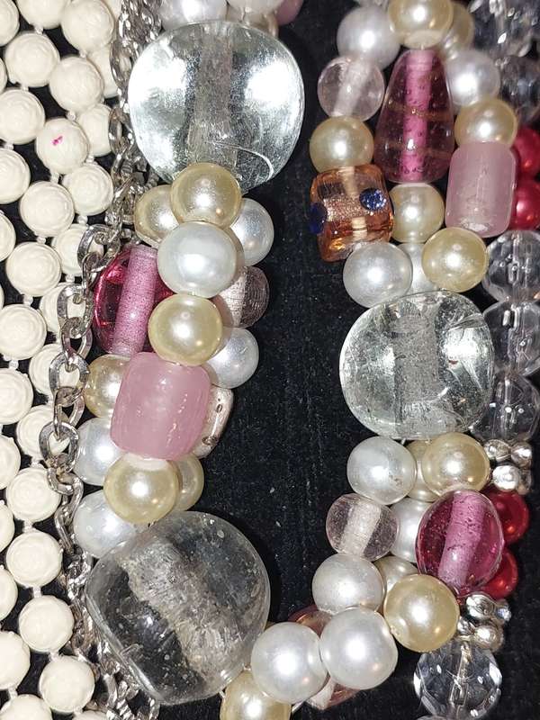 A COLLECTION OF COSTUME NECKLACES SOLD AS IS