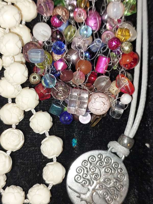 A COLLECTION OF COSTUME NECKLACES SOLD AS IS