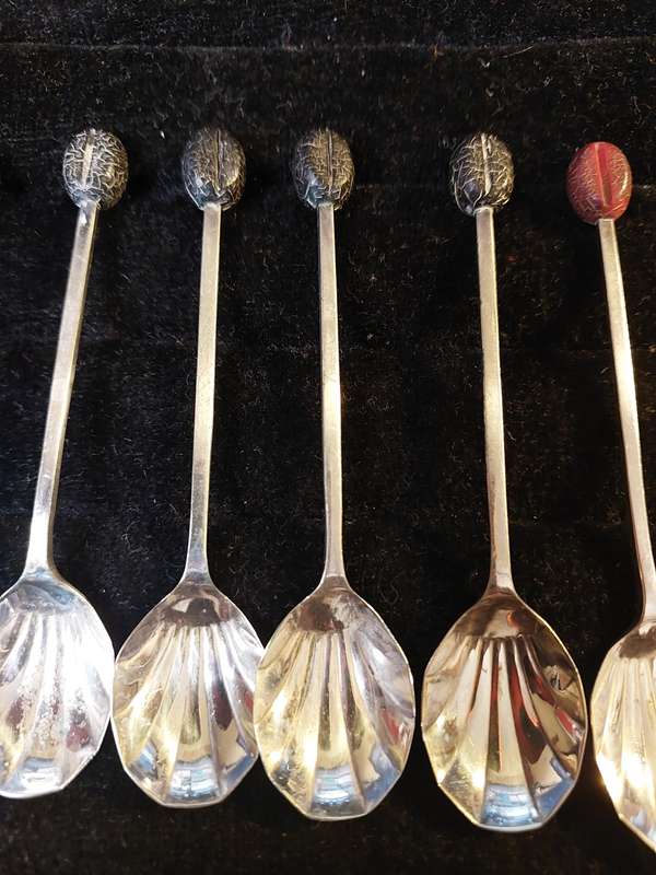 A SET OF 12 COFFEE BEAN SPOONS