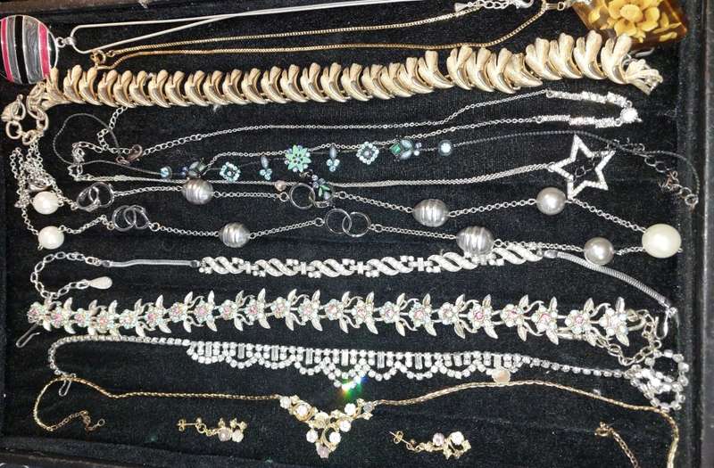 A VINTAGE COLLECTION OF DESIGNER COSTUME NECKLACES SOLD AS IS