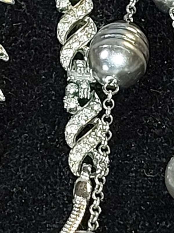 A VINTAGE COLLECTION OF DESIGNER COSTUME NECKLACES SOLD AS IS