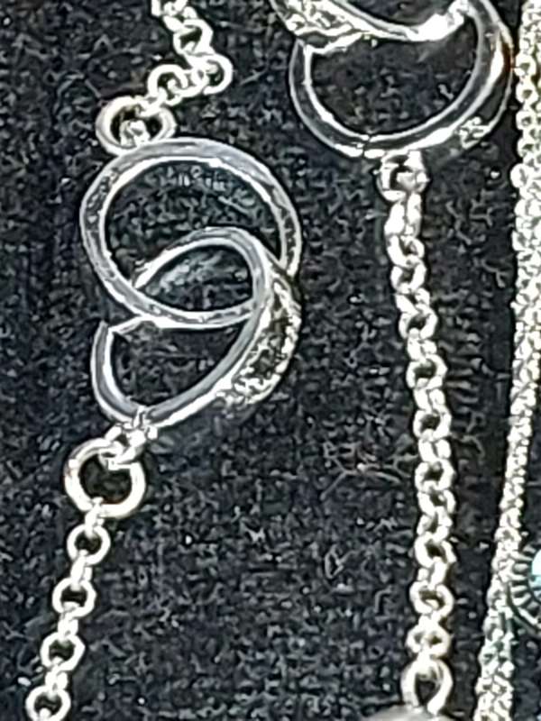 A VINTAGE COLLECTION OF DESIGNER COSTUME NECKLACES SOLD AS IS