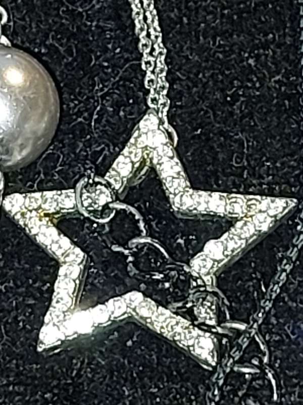 A VINTAGE COLLECTION OF DESIGNER COSTUME NECKLACES SOLD AS IS
