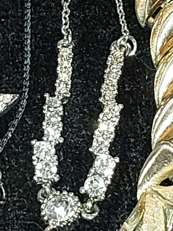 A VINTAGE COLLECTION OF DESIGNER COSTUME NECKLACES SOLD AS IS