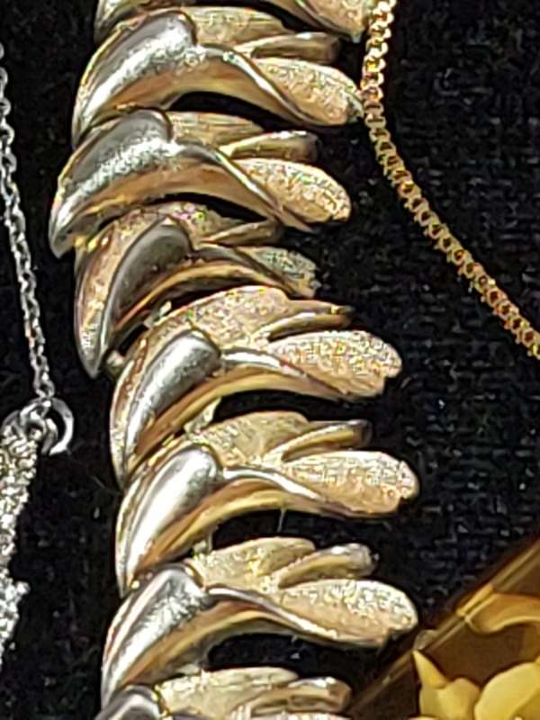 A VINTAGE COLLECTION OF DESIGNER COSTUME NECKLACES SOLD AS IS