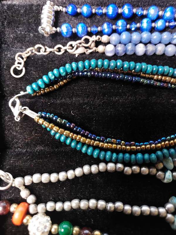 A VINTAGE COLLECTION OF TURQUOIS AND DIAMANTE COSTUME JEWELRY SOLD AS IS