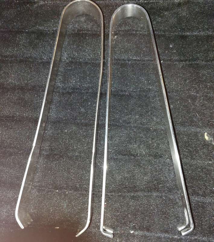 TWO STAINLESS STEEL SALAD TONGS SOLD AS IS