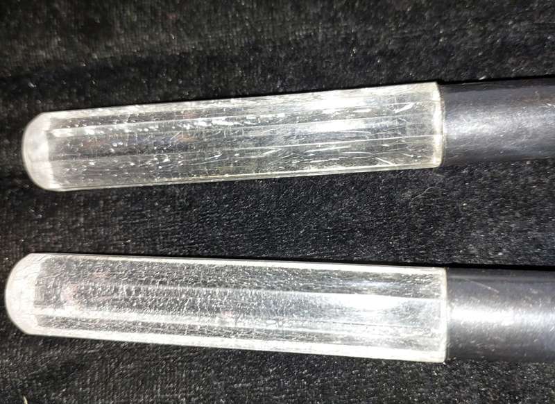 A  SET JAPANESE STAINLESS STEEL AND PERSPECT HANDLE SALAD LADELS SOLD AS IS