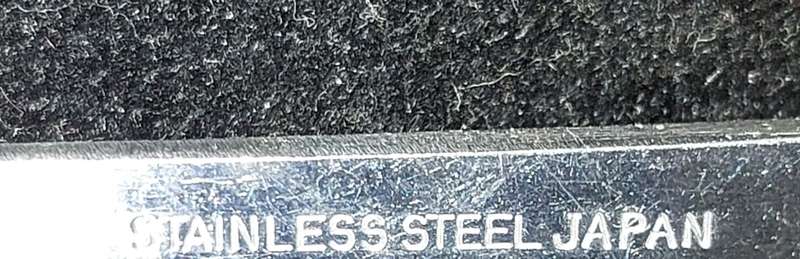 A  SET JAPANESE STAINLESS STEEL AND PERSPECT HANDLE SALAD LADELS SOLD AS IS
