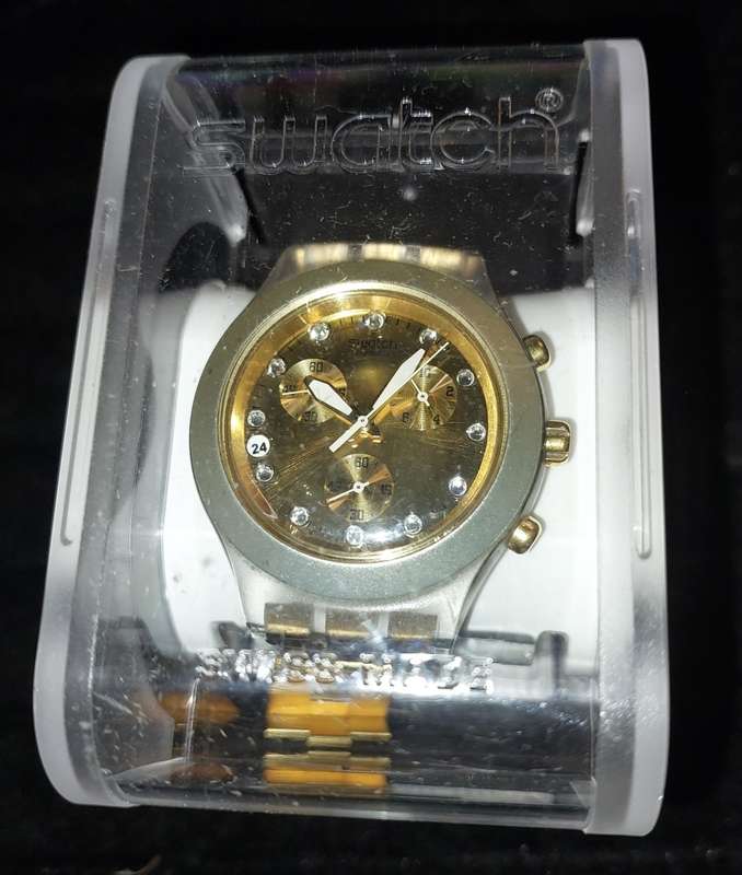 A VINTAGE SWATCH DIAPHANE CHRONO GOLD PLATED WITH EXTRA LINKS AND ALL PAPERS (WORKING)