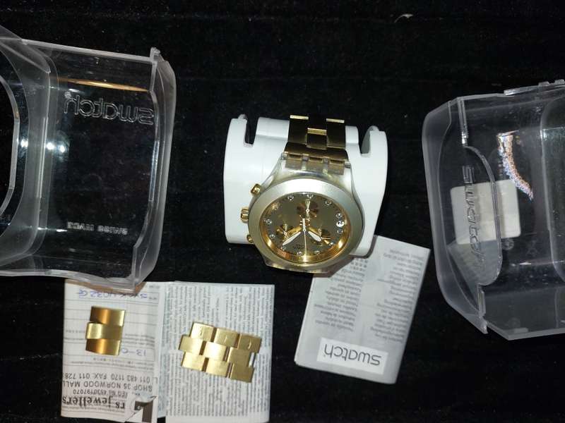 A VINTAGE SWATCH DIAPHANE CHRONO GOLD PLATED WITH EXTRA LINKS AND ALL PAPERS (WORKING)