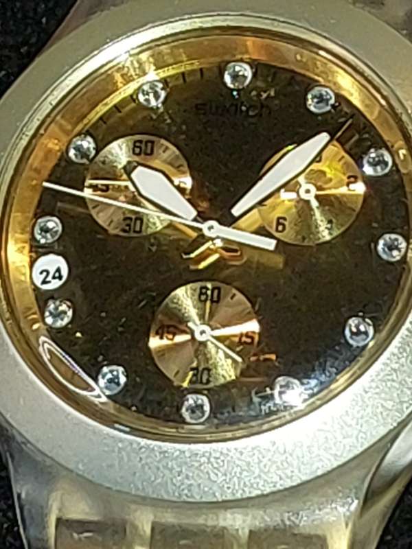 A VINTAGE SWATCH DIAPHANE CHRONO GOLD PLATED WITH EXTRA LINKS AND ALL PAPERS (WORKING)