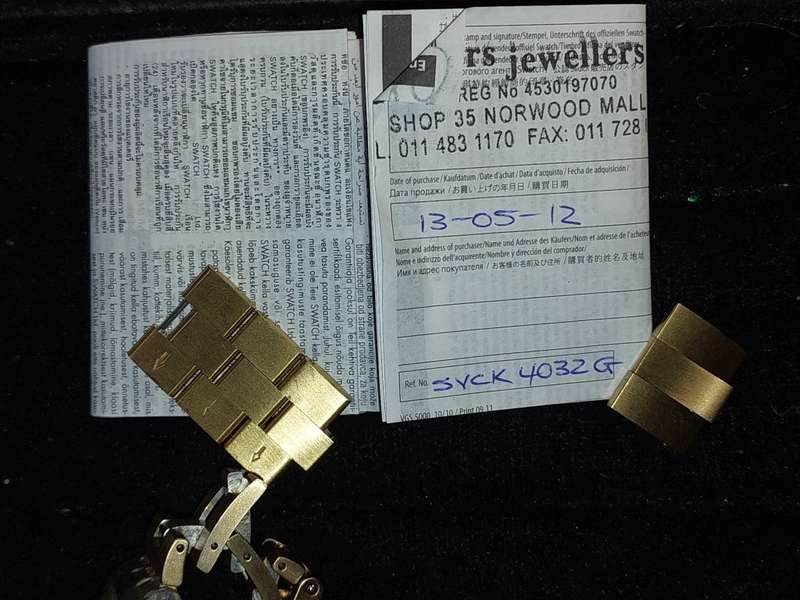 A VINTAGE SWATCH DIAPHANE CHRONO GOLD PLATED WITH EXTRA LINKS AND ALL PAPERS (WORKING)