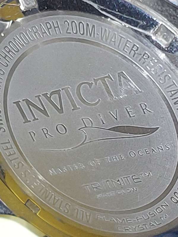 A INVICTA 48 MM MENS PRO DIVE WATCH WITH ALL PAPERWORK AND EXTRA LINK STAINLESS STEEL MODEL NUMBER 8