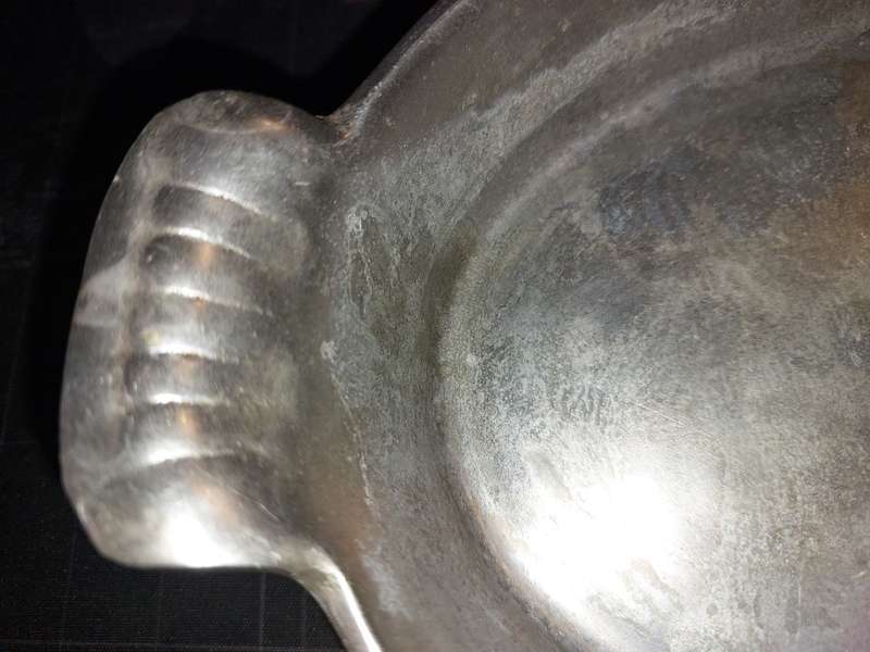 A MIDSIZE CASSEROLE STYLE ALUMINIUM ALLOY SERVING DISH SOLD AS IS