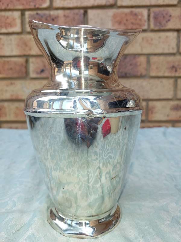 A VINTAGE ROMAN STYLE SILVER PLATED JUG