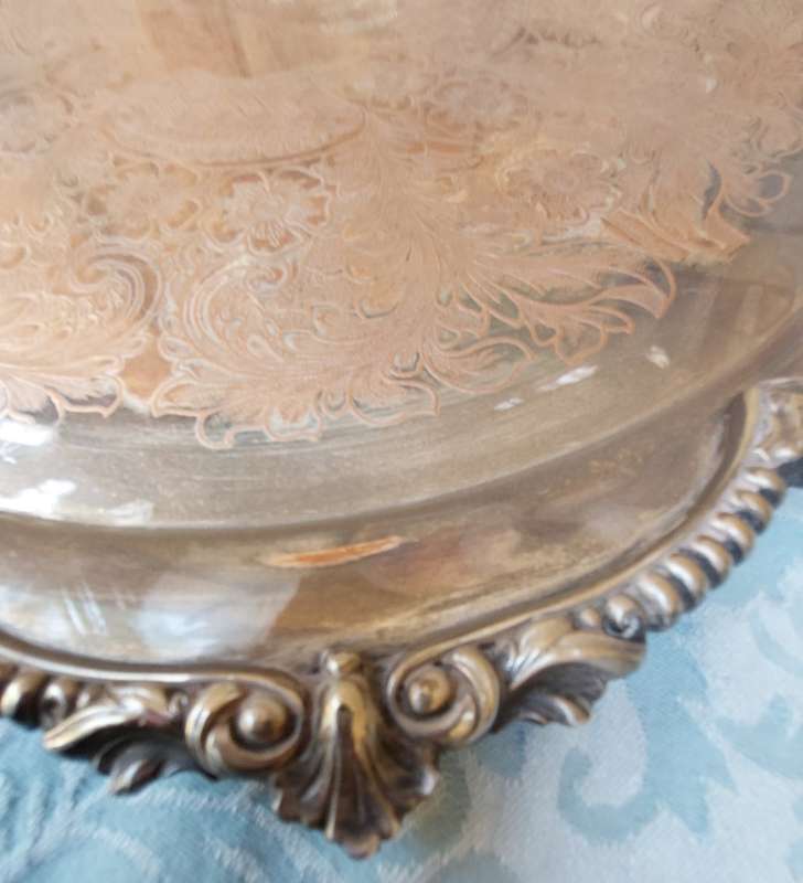 A VICTORIAN DESIGN SILVER PLATED SERVING TRAY SOLD AS IS