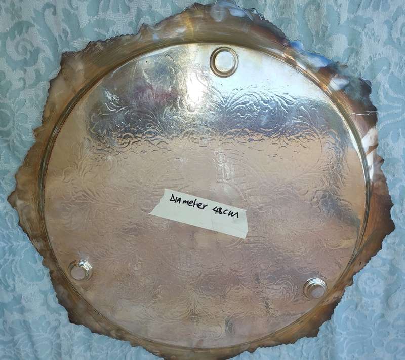A VICTORIAN DESIGN SILVER PLATED SERVING TRAY SOLD AS IS