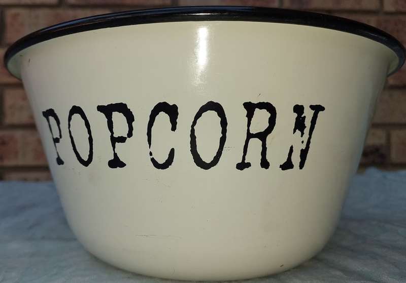 A FARM-STYLE ENAMEL POPCORN BOWL SOLD AS IS
