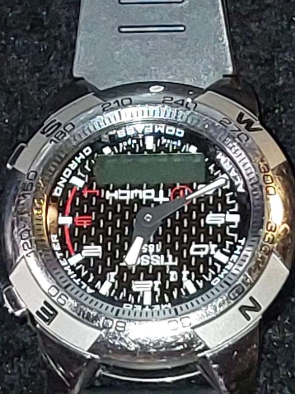 A RARE VINTAGE TISSOT SMART WATCH,TITANIUM SAPPHIRE CRYSTAL T TOUCH