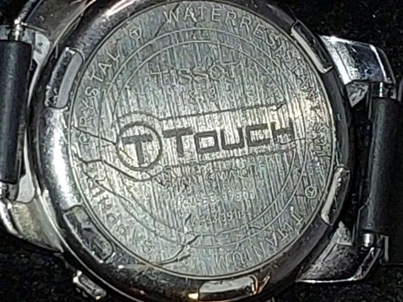 A RARE VINTAGE TISSOT SMART WATCH,TITANIUM SAPPHIRE CRYSTAL T TOUCH