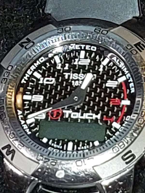 A RARE VINTAGE TISSOT SMART WATCH,TITANIUM SAPPHIRE CRYSTAL T TOUCH