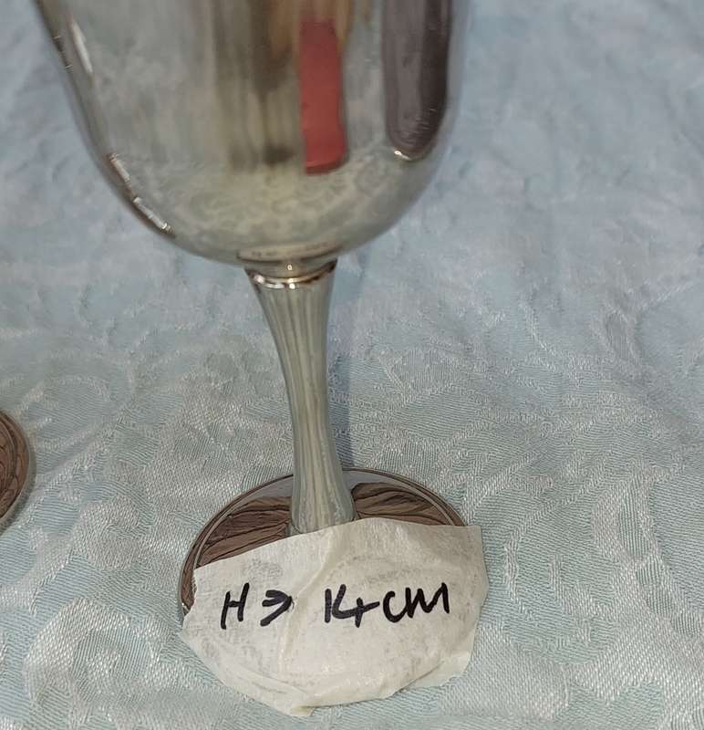 A SET OF FOUR WINE FLUTES SILVER PLATED