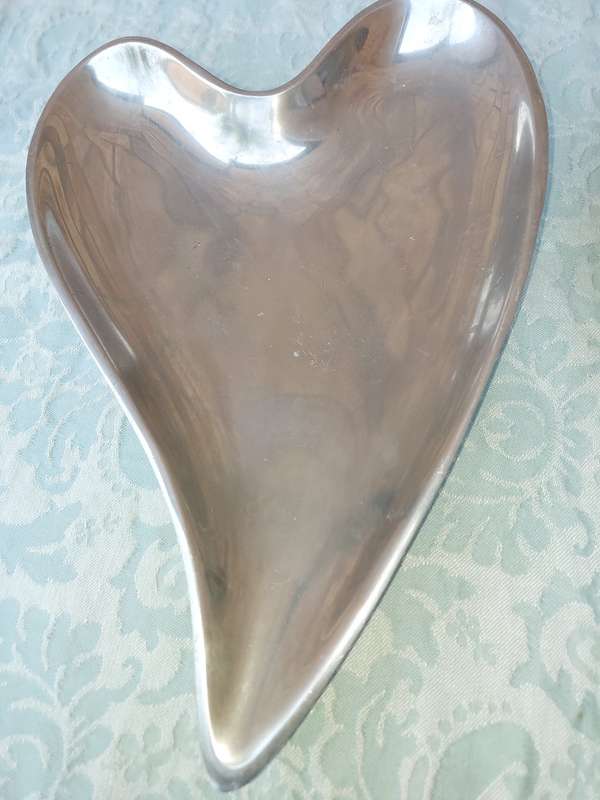A  COLLECTION OF ALUMINIUM ALLOY PLATTERS  SOLD AS IS