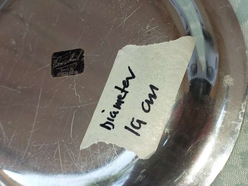 A  COLLECTION OF ALUMINIUM ALLOY PLATTERS  SOLD AS IS