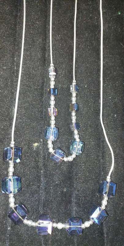 A VINTAGE DESIGNER COLLECTION OF COSTUME NECKLACES SOLD AS IS